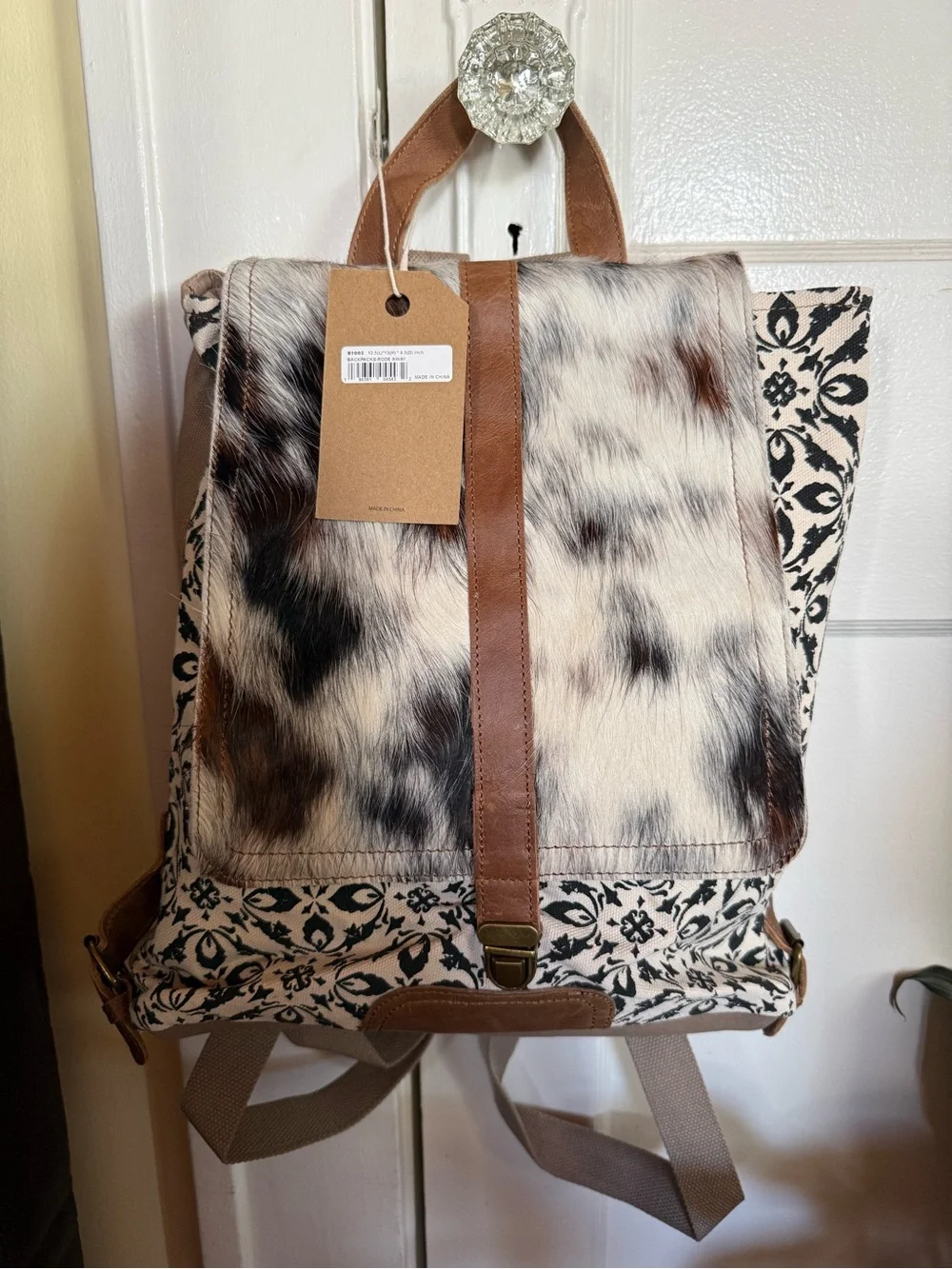 Neutral Cowhide-Pattern Canvas Backpack with Brown Trim